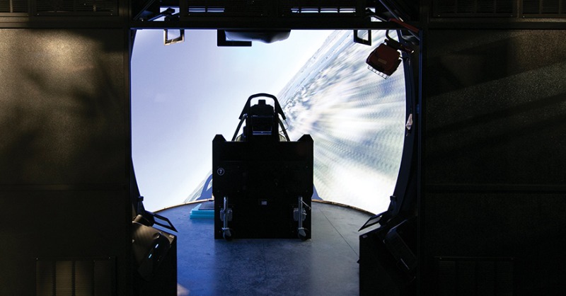 NationalDefense's tweet photo. Air Force, Navy Aircraft Simulator Facility Stretching Its Wings | Story by @LauraHeckmann | @usairforce @usnavy #TrainingandSimulation #Aviation @NAVAIRNews @iitsec @NDIAToday @AFLCMCofficial