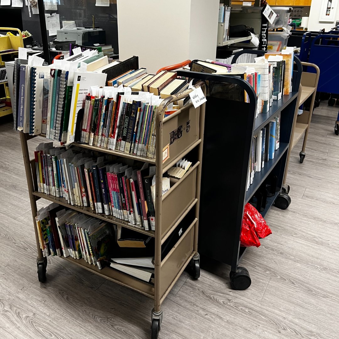 WellandLibrary's tweet photo. A little chaos is always necessary! Behind the scenes, we work hard to curate the perfect combination of books and resources just for you. #BehindTheScenes #LibraryLife #CuratedCollections #BookLovers #LibraryMagic https://t.co/MSYmeLf6ZX