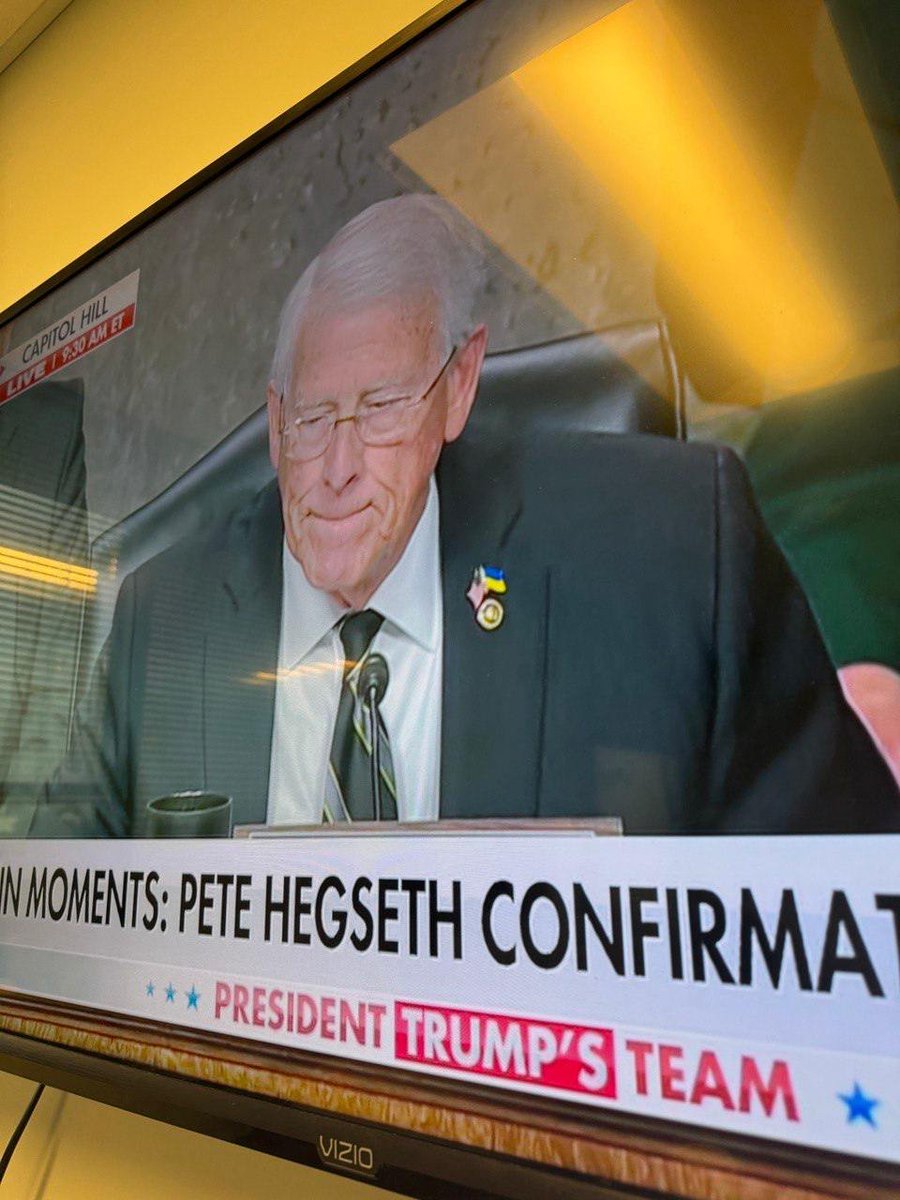 Why is the Chairman Wicker of the US Senate Armed Services Committee wearing a foreign flag today?