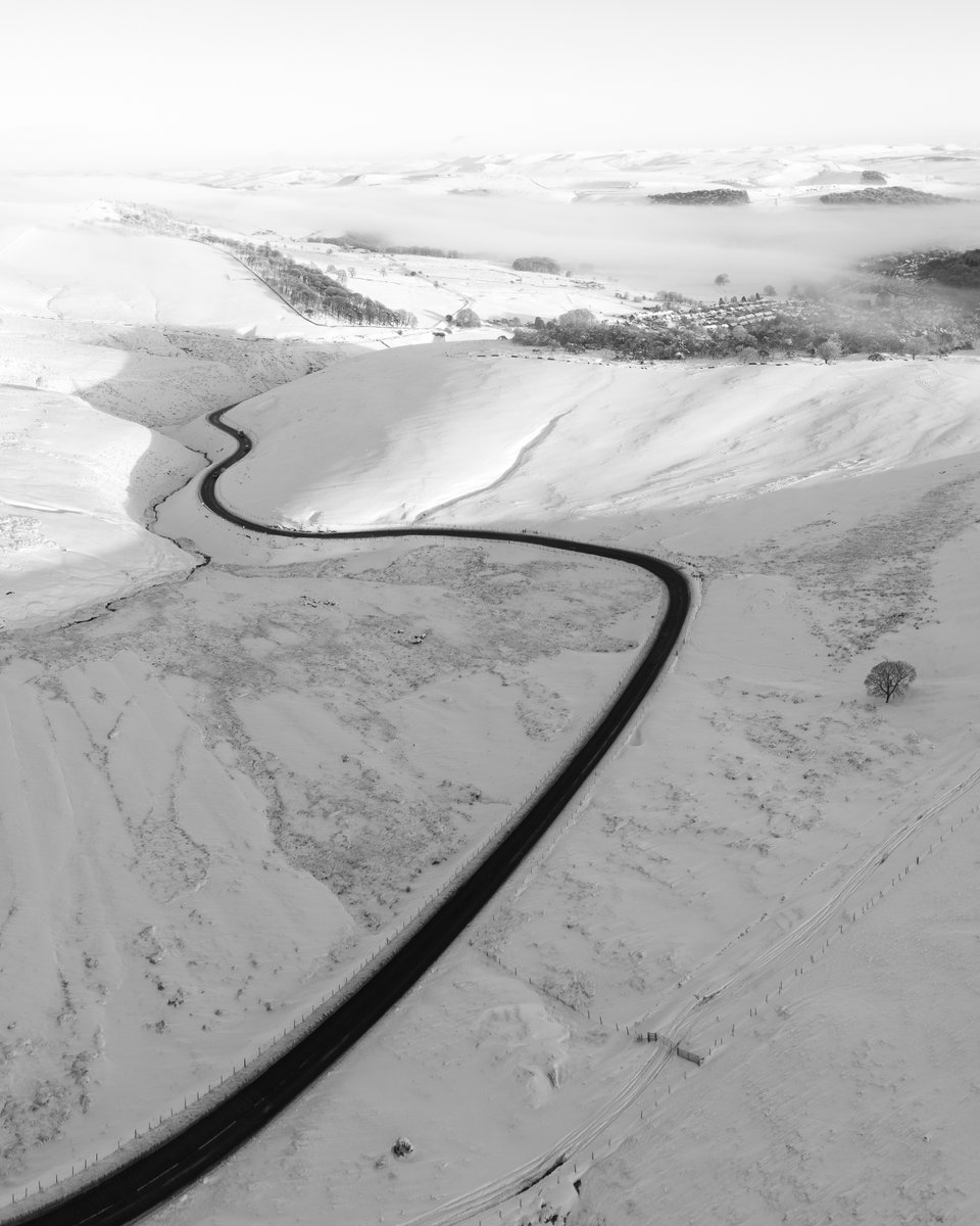 I don't do B&amp;W much but this seemed to suit it... road down into Buxton in the Peak District.