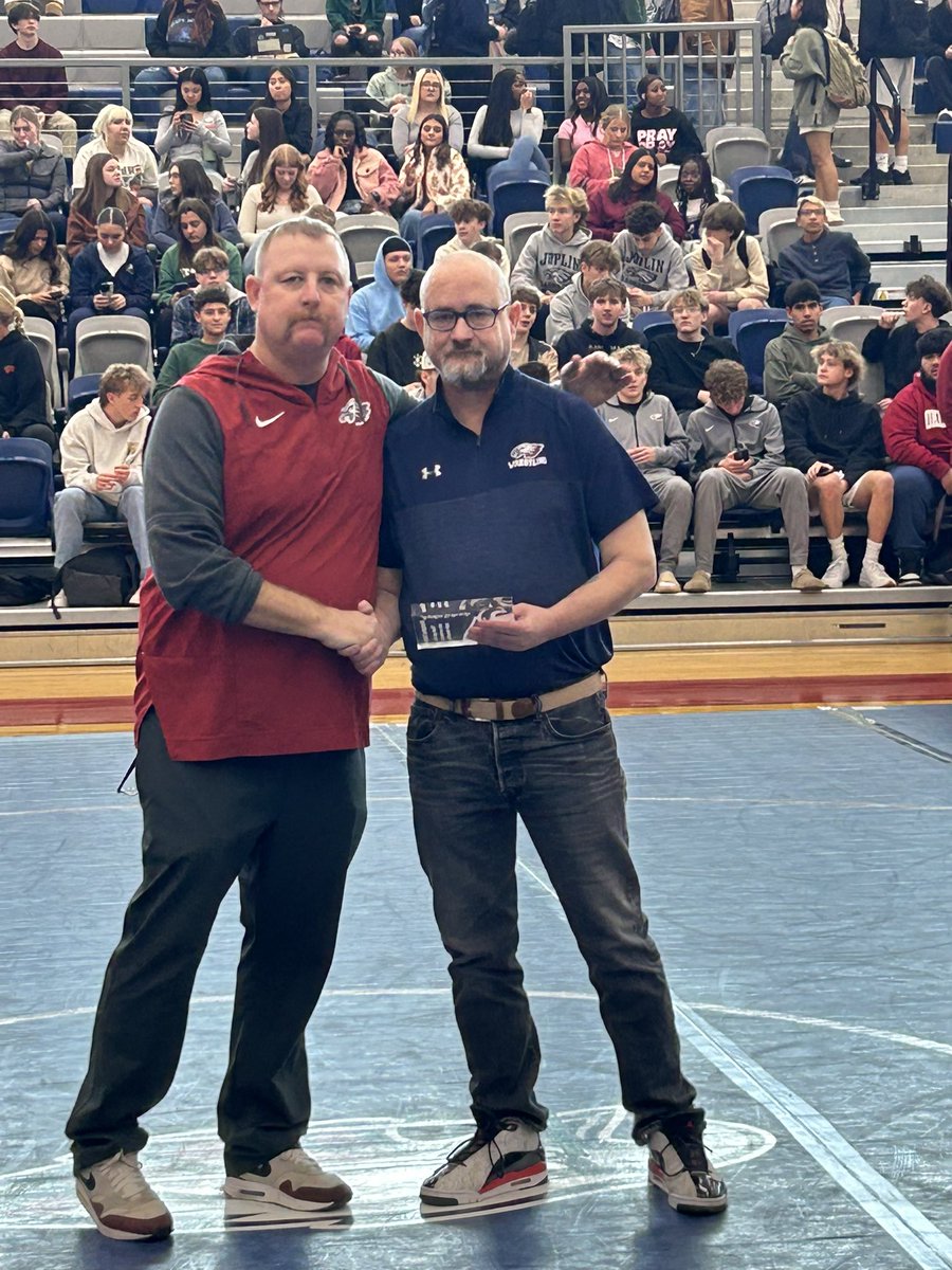 It was our honor to recognize Joplin MS Wrestling Coach, Kris Dishman, for his years of dedication to the Joplin wrestling program.  Coach Dishman will be retiring at the conclusion of this school year!  Thank you Coach Dishman and best of luck to you! #OneTeam #GoEagles