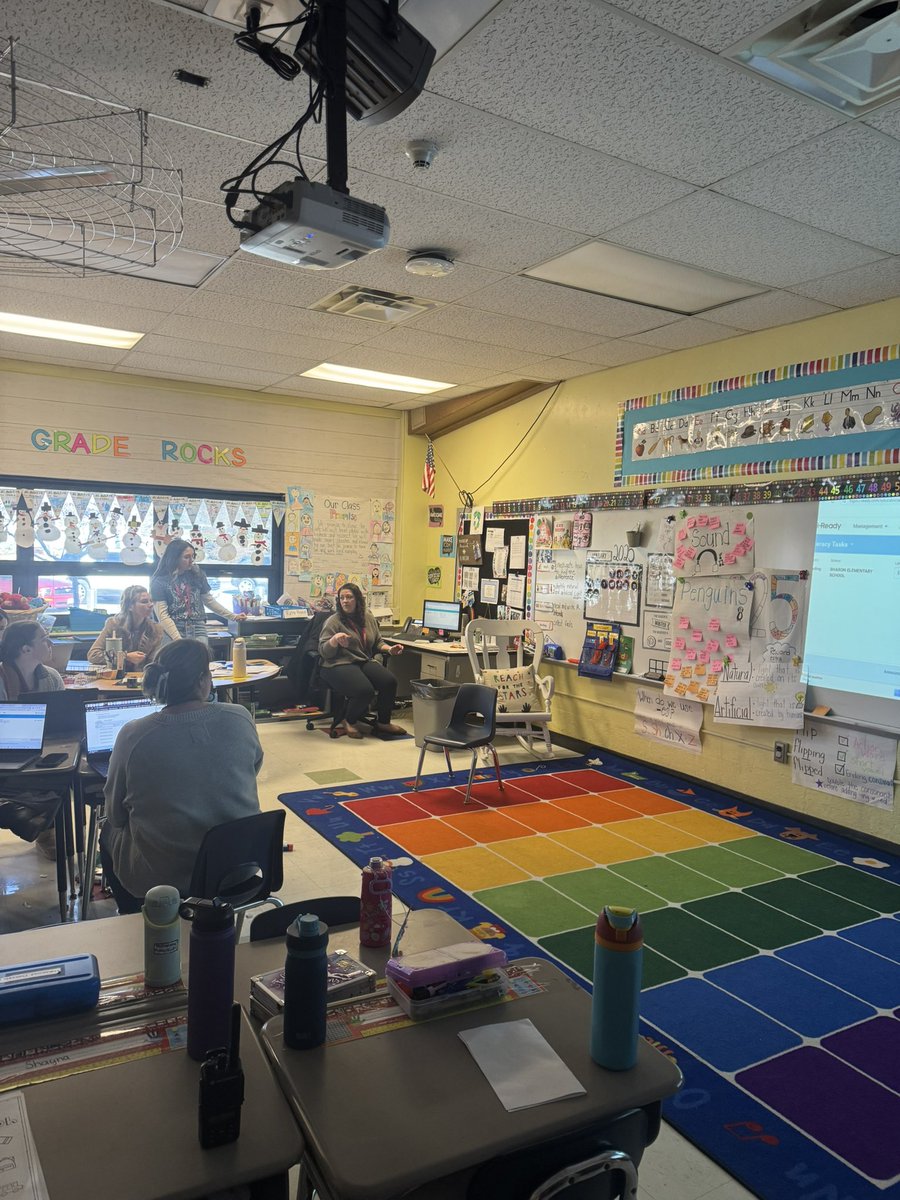 Mrs. Cammarano modeling during First Grade PLC.