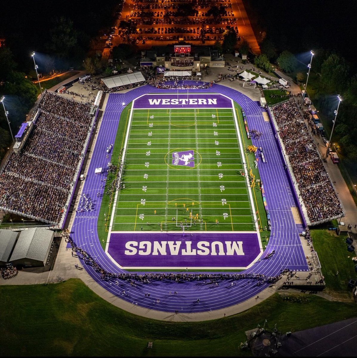 O_Chmielinski's tweet photo. After a great visit with Coach Richard I’m blessed to have received a scholarship offer from @westernuFB @Coach_Gates https://t.co/HMypZxAunk