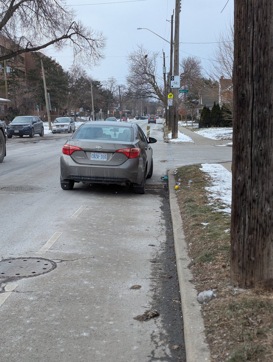 cycletherapyHam's tweet photo. #BlockedInHamOnt Maplewood at Albert. Blocking bike lanes gets people killed. https://t.co/sxt0iKEupt