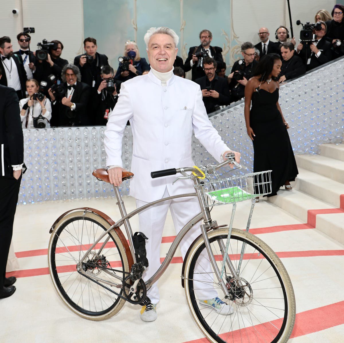 Actor Timothée Chalamet takes a page out of the David Byrne playbook and arrives at a red carpet event via sustainable transport.