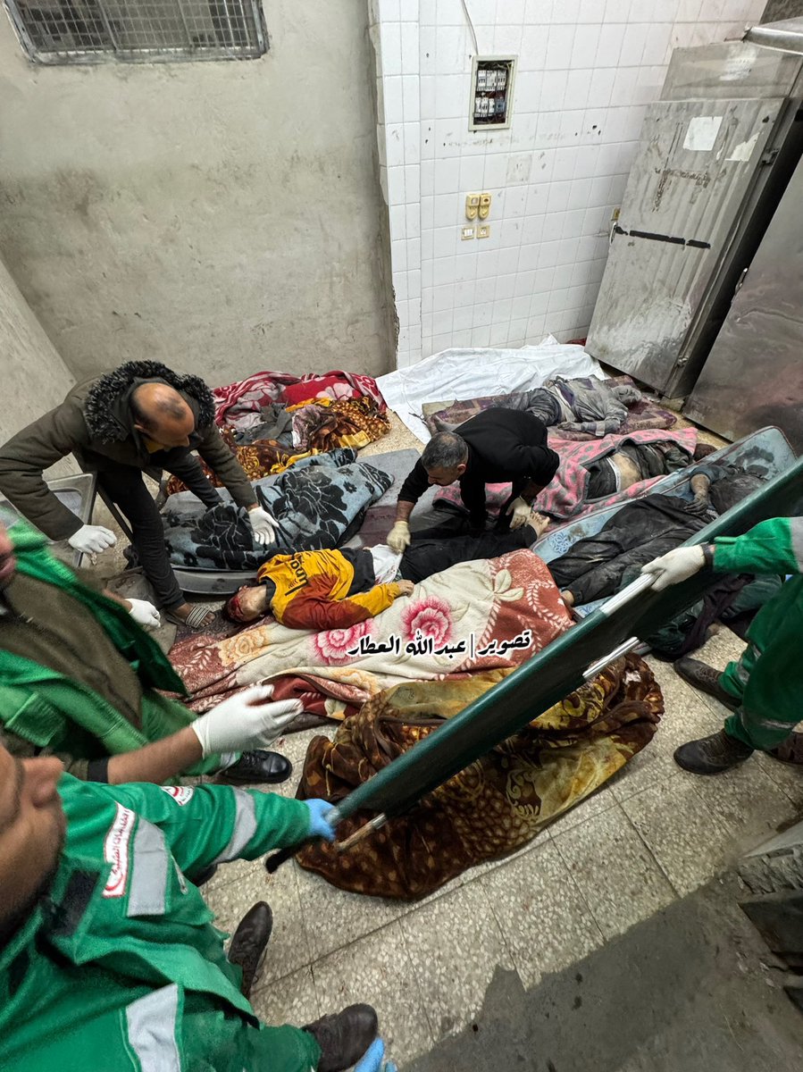 dn_osama_rabee's tweet photo. In a new and massive massacre committed by the occupation, 10 martyrs have been reported so far, including women and children, due to the targeting of a house sheltering displaced individuals from the Shaqoura family in Deir al-Balah, in the center of the Gaza Strip. Rescue teams are still evacuating the area, with missing people still under the rubble.