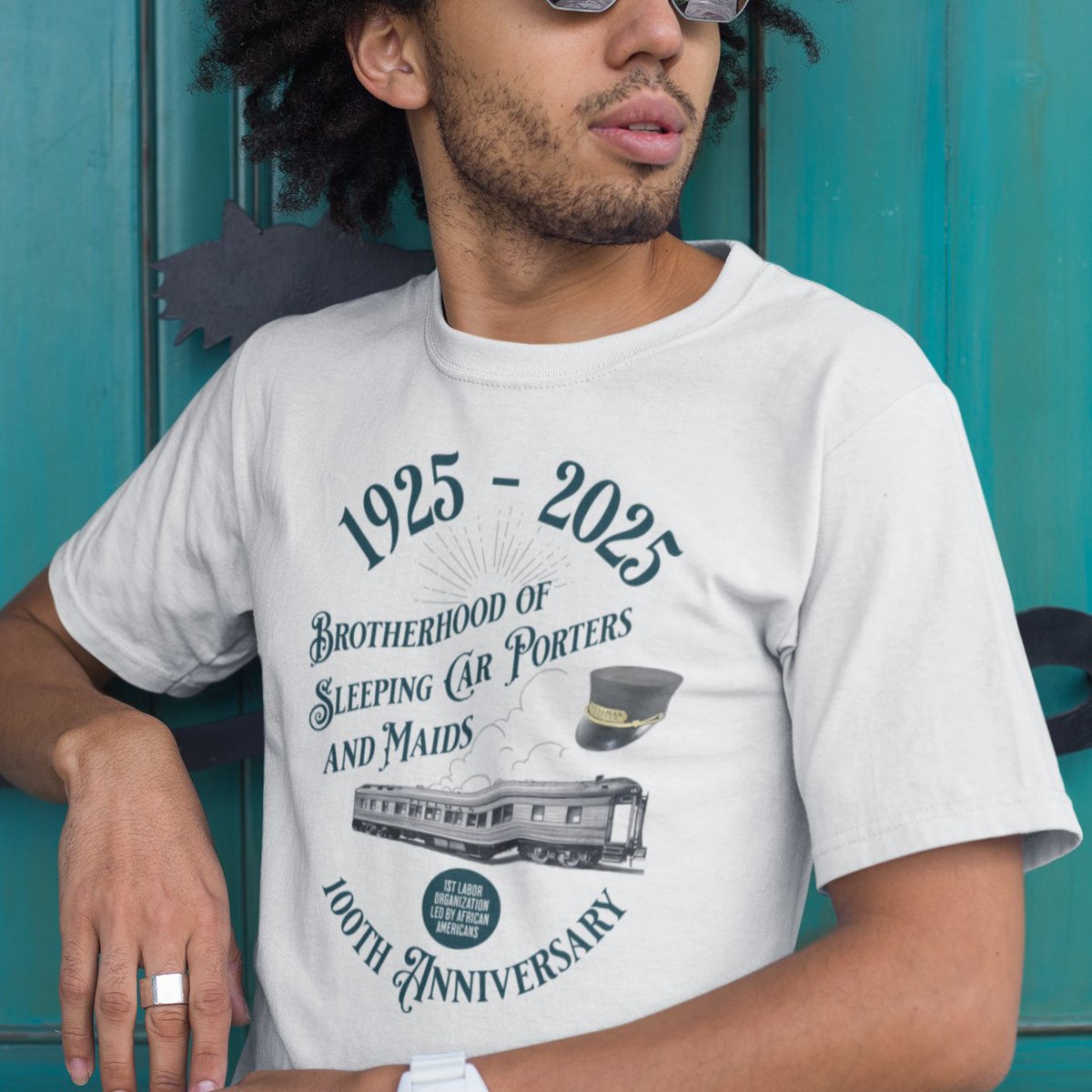 TransferArts's tweet photo. Celebrate the 100th Anniversary of "The Brotherhood of Sleeping Car Porters and Maids" #BCSP with this commemorative tee.  Pay tribute to first labor organization led by African Americans. GET https://t.co/SgFkhPnCeh #BSCP #BlackHistory #blackhistoryshirt  @bhmuk @AfricanArchives https://t.co/NRBHZGqHfB