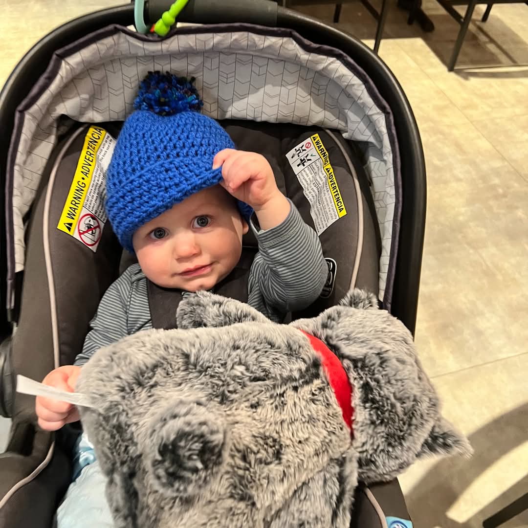 Your donations make a difference.
From Providence, Rhode Island:
Looking cute in our hat. Went to the hospital when it was snowing and luckily, we left with a hat!