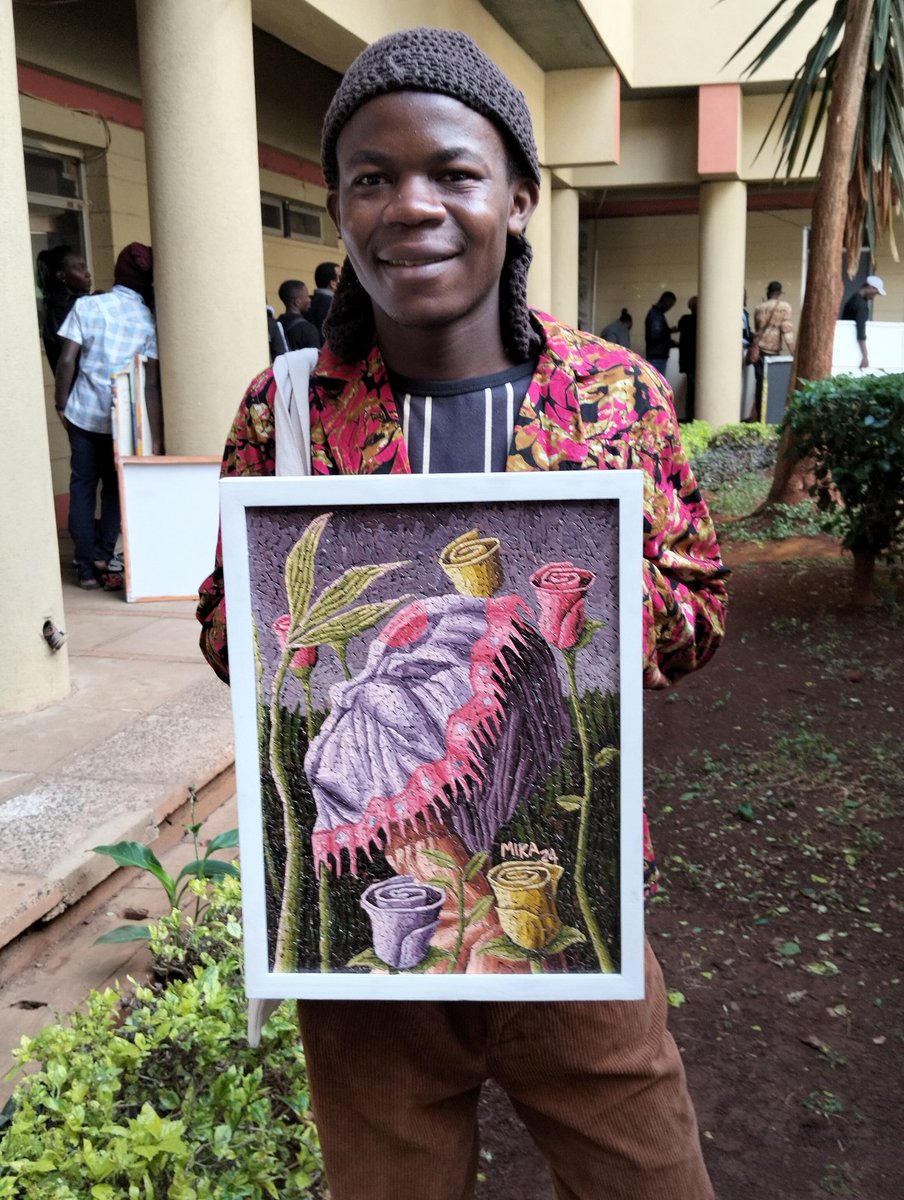 The art and the artist. Here's <a href="/MikaObanda/">mika Obanda</a> with one of the artworks - created with eggshells - he exhibited at the last  #AffordableArtShowKe