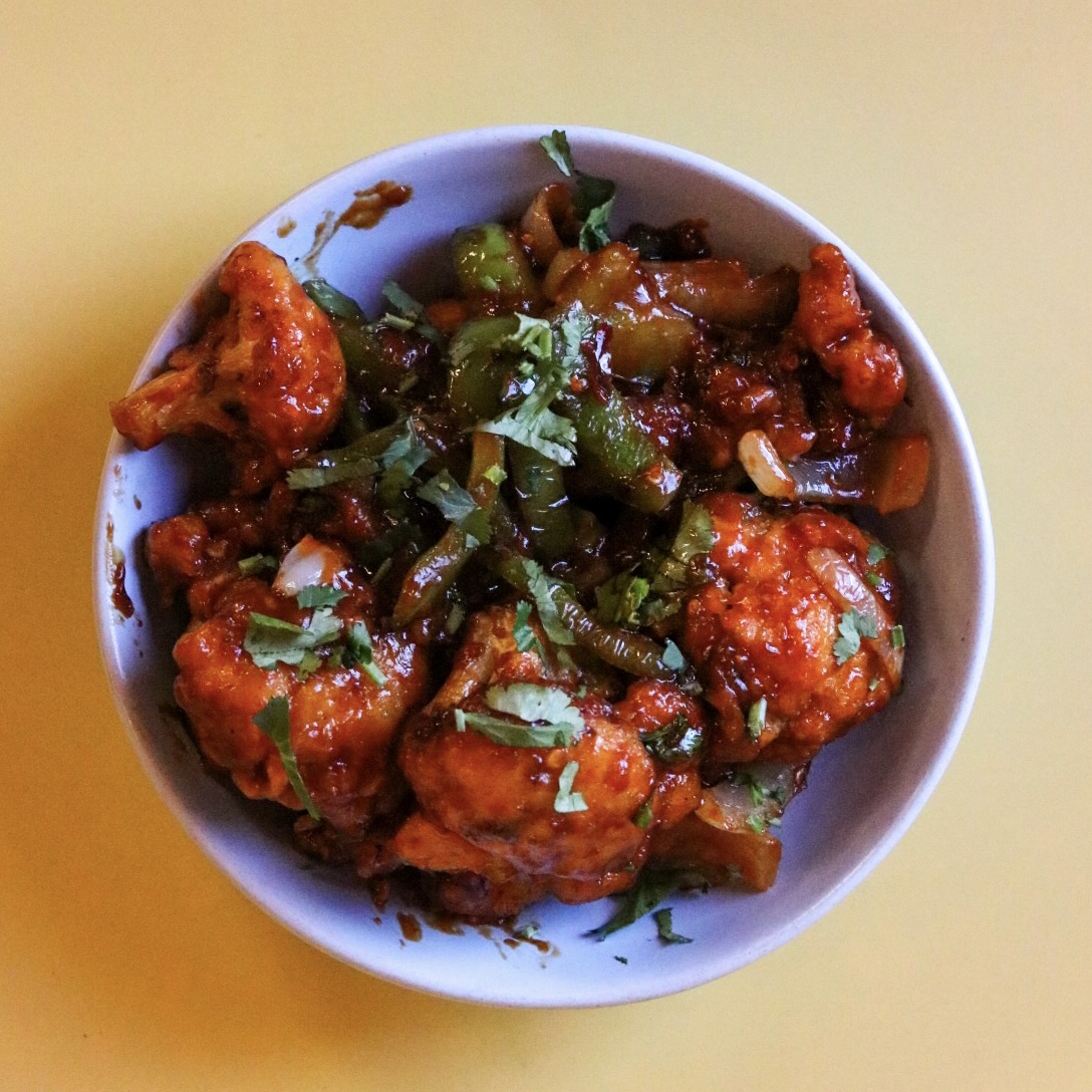 HAKKA CHILLI GOBI 🌶️

Crispy cauliflower florets tossed in a spicy, tangy sauce