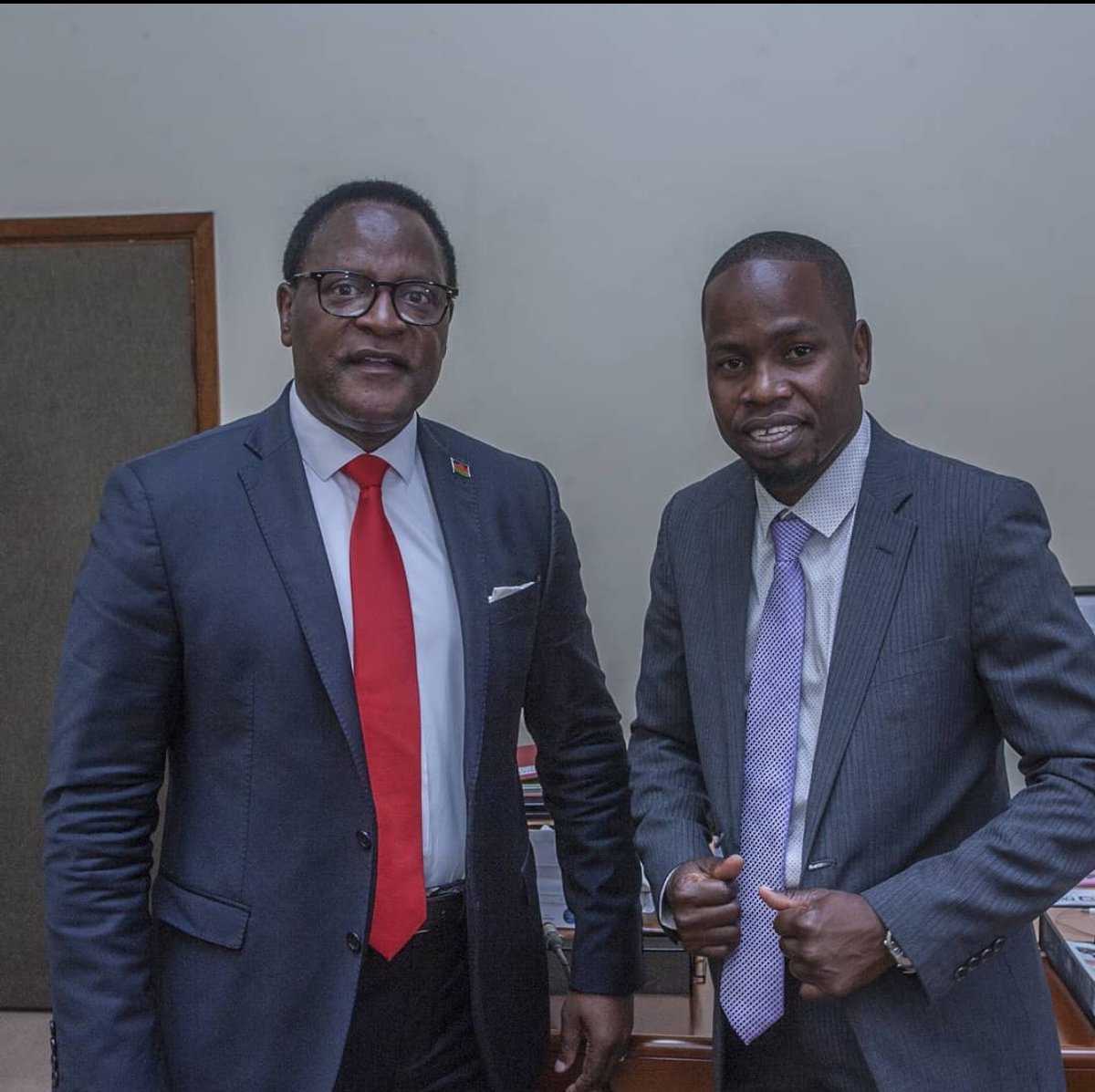 mcbrams's tweet photo. Throwback to when Dr. Laz @LAZARUSCHAKWERA and I were tight! Here we are, striking a pose at #Malawi Congress Party HQ just a month before he levelled up to State House in the 2020 elections. I like to think I brought him good luck – he just hasn’t thanked me yet! https://t.co/mxvBlCxy1i