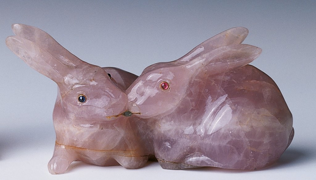 Two rabbits by Cartier, 1900. Rose quartz, sapphire, ruby. Royal Collection.