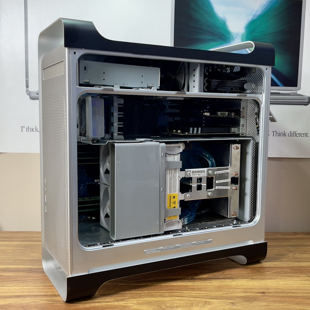 CircuitSphere_'s tweet photo. Fresh look for a classic machine! Just wrapped my Quad PowerMac G5 in sleek matte black vinyl. It’s giving timeless power a modern edge. What do you think of this transformation? #PowerMacG5 #RetroTech #MacMod #vintagemac https://t.co/IX89u7HfYr