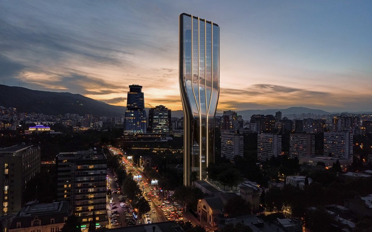 parametricarch's tweet photo. 1/3
🧵Cinema City Tower, designed by @Stipfold in 2024, integrates historical rehabilitation with contemporary design on a compact 700 m² site in Tbilisi. Its vertical orientation and dynamic east-west axis enhance the skyline, while a façade of white fiber concrete and metal framework ensures durability and visual impact.