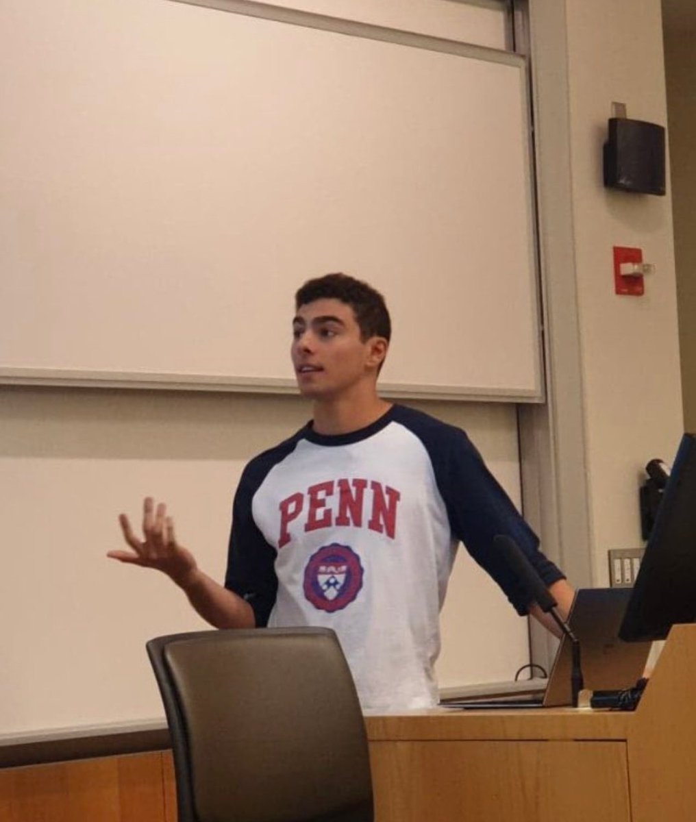 MinkieMadam's tweet image. This man already had fans in college because why would someone take a photo of him doing a presentation lmao