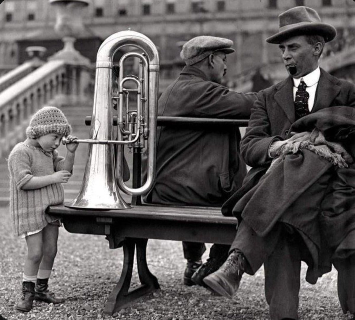 Just stumbled upon this gem! 🎺 A kid using a tuba while these gents look on like it's just another Tuesday. 😂 #VintageVibes #MusicAnywhere #ParisianLife #history #historypulse #fyp #fun #viral