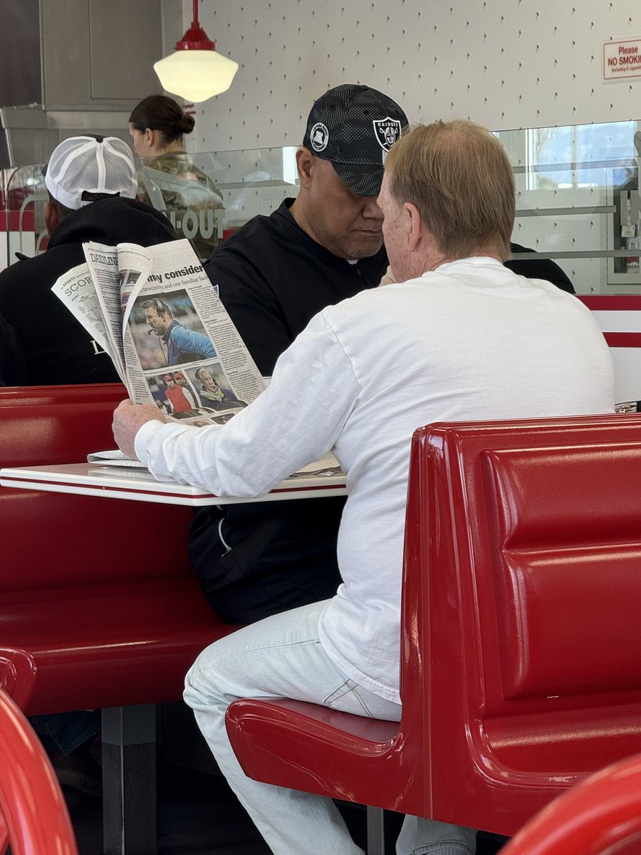 Danoelguapo's tweet photo. A friend got this picture of Mark Davis at In-N-Out Burger reading the newspaper about Mark Davis firing the Raiders coach and who he should hire https://t.co/3dFGolyIRk