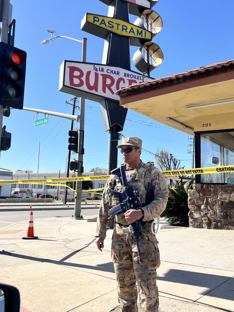 M16s out to protect the Tommy’s Burger