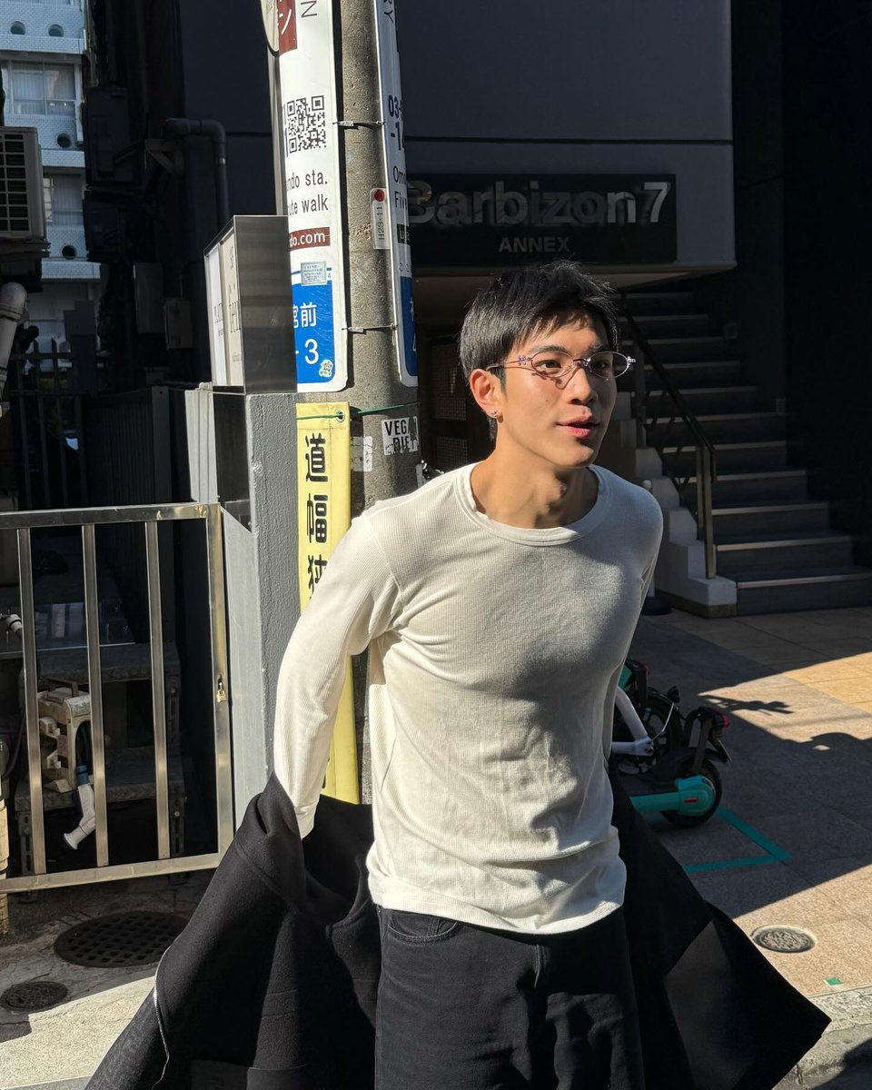 Exploring the city streets on a bright and cheerful day, this moment captures the carefree joy of a vacation well spent.