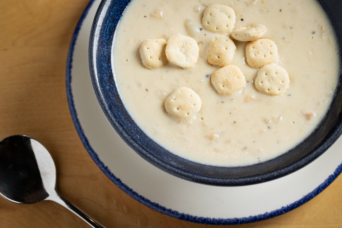 BostonLogan's tweet photo. It's Chowder Day! Celebrate this wicked good ‘Legal’ holiday @LegalSeaFoods! Grab a mug of New England Clam Chowder for just $2 today! A true New England staple that you can't miss before your flight. Dine in or order ahead via https://t.co/ysS6688aA9. #BosShopDine #ChowderDay https://t.co/lOUo0gqqu7