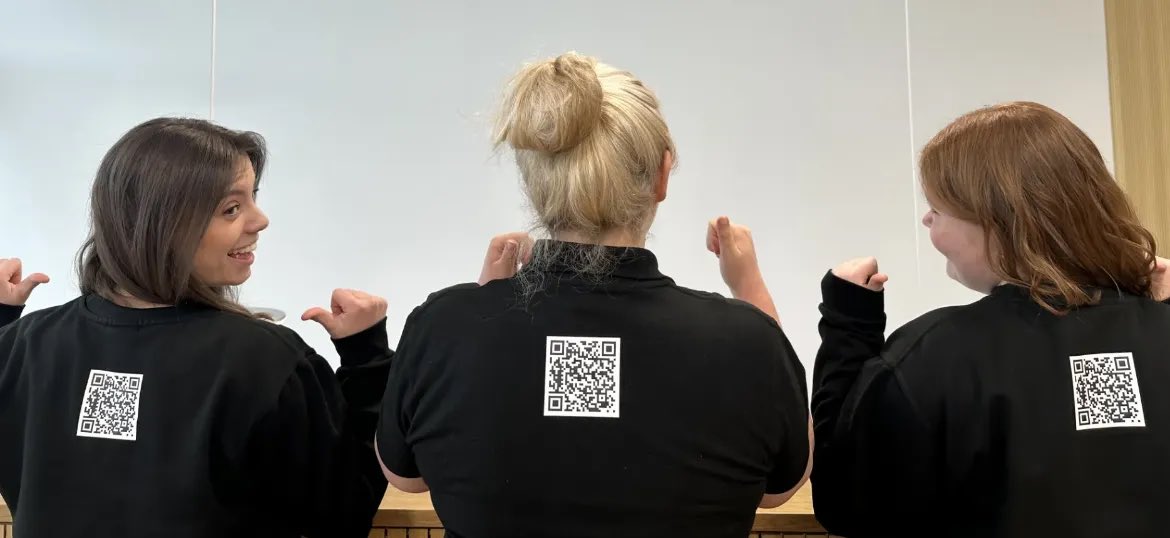 3 of our skydiving fundraisers showing off their polo shirts with QR code, able to accept donations anytime 😁🪂👍
Try it, scan Liz’s back it will take you to our fundraising page