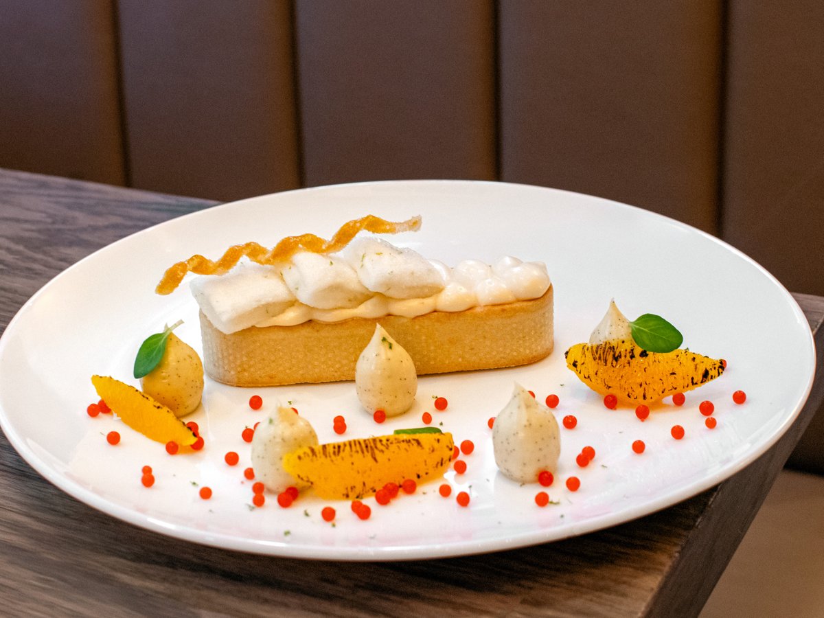 Experience the Mooo Beacon Hill exclusive, Winter Citrus Tart, featuring Orange Meringue Pie, Grand Marnier Sabayon, and Lemongrass-Vanilla Crémeux. Make your reservation at MoooRestaurant.com