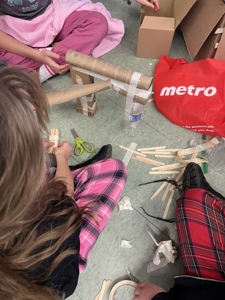 MsStevens_'s tweet photo. S’s are enjoying using recycling material to build a marble run structure that includes a pulley or gear system https://t.co/VnWHgg3Vxi