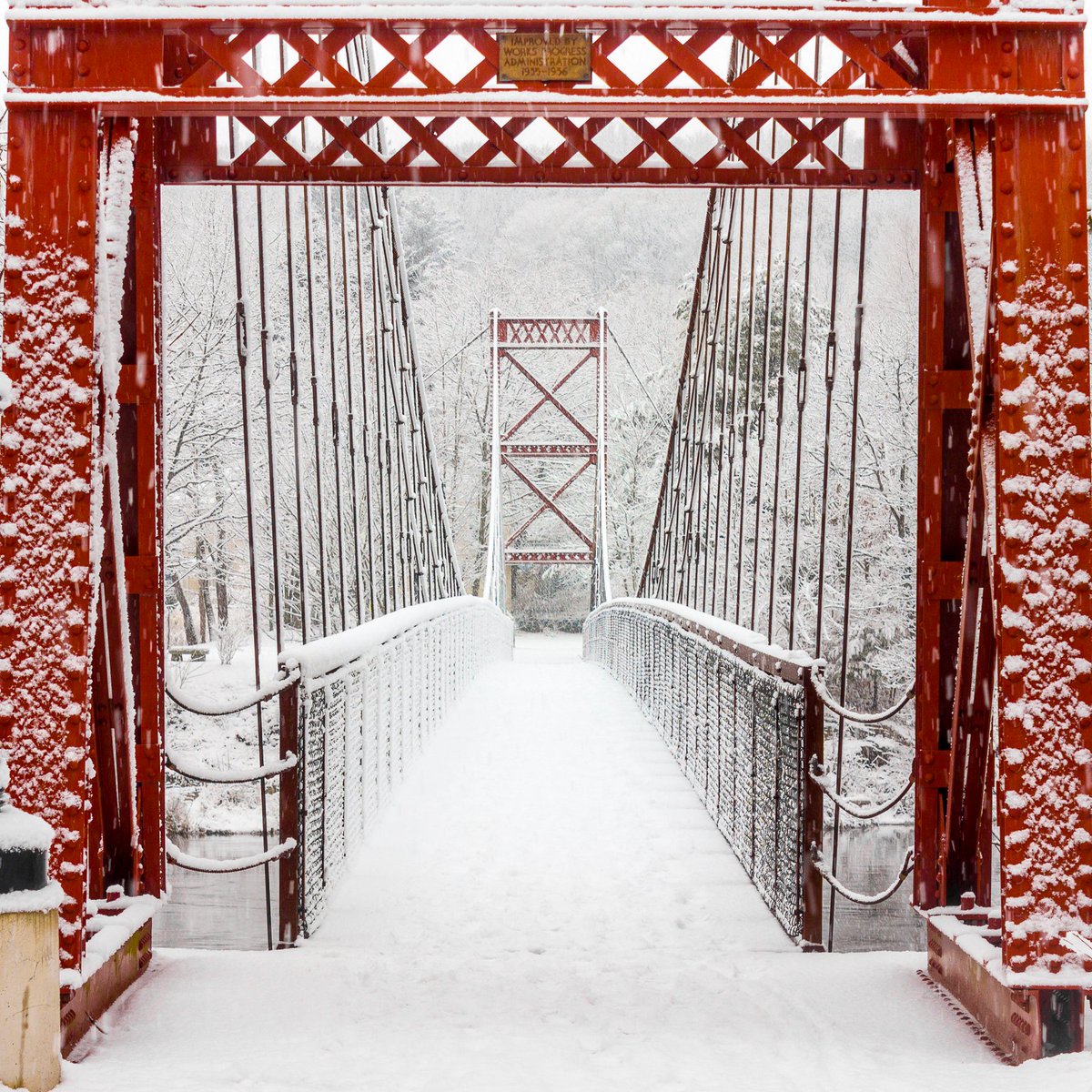 The Swinging Bridge that connects Brunswick and Topsham, Maine looks awesome covered in snow.