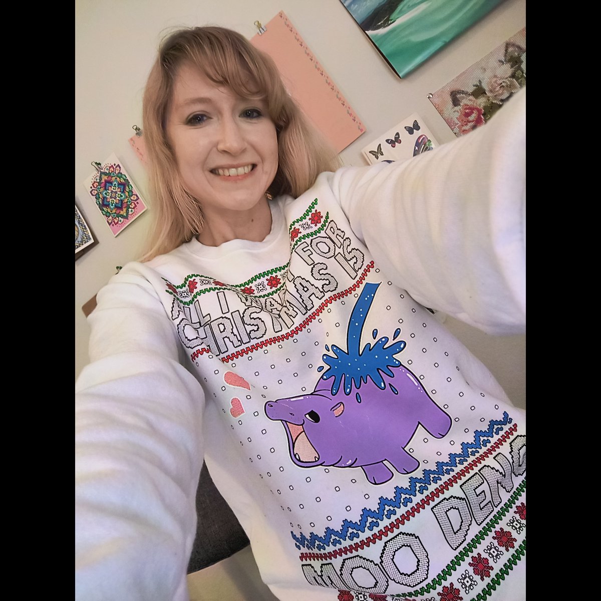 catghoststories's tweet photo. Wanted to share this cute #moodeng sweater my fiancé got me for Christmas! I believe the original artist is janatshie (Hopefully the sweater company went through the proper licensing process 🧐 #payyourartists ) 🦛💜🎄

#cute #cuteart #cuteclothes #sweaters #Christmas https://t.co/A6yGyJn11s