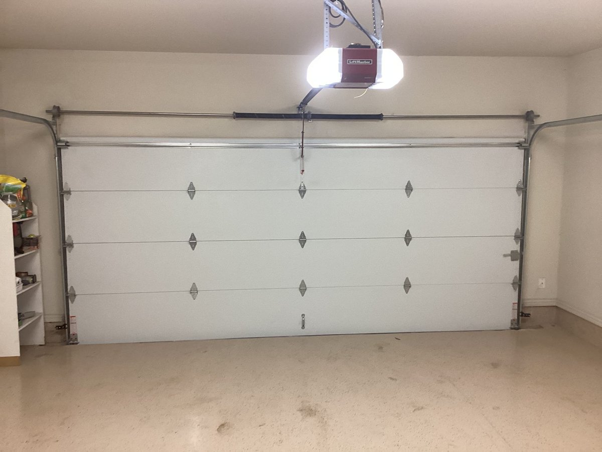PlanoOverhead's tweet photo. Transform your home's curb appeal with a classic touch! We’re excited to showcase our installation of a beautiful brown Long Raised Panel garage door. This stunning addition not only enhances the aesthetic of the property but also provides durability and security. Ready to ele... https://t.co/mFn8FkxAfp