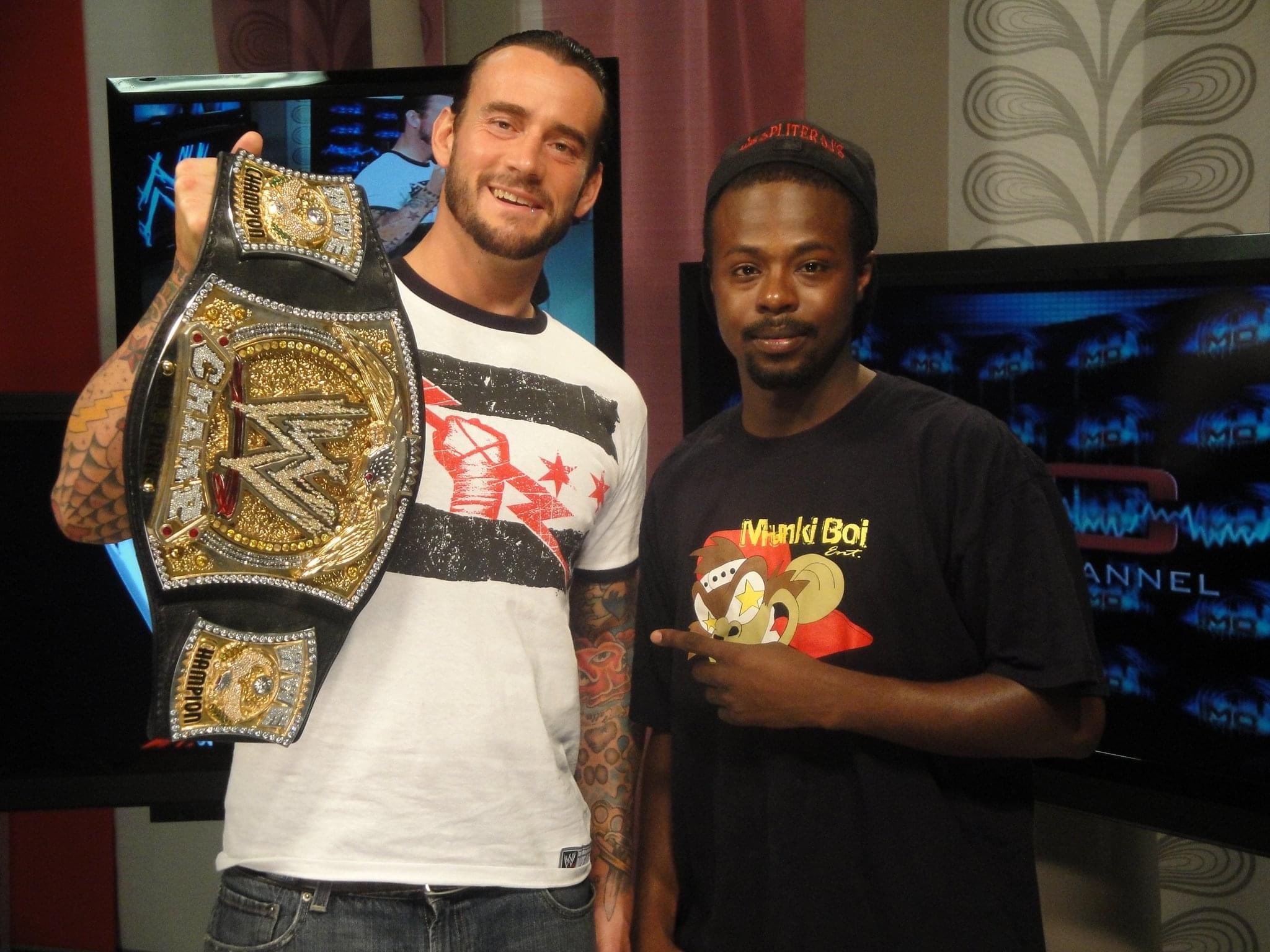 Going threw my phone found this me and @CMPunk That belt was heavy lol https://t.co/JjWQstPPMu