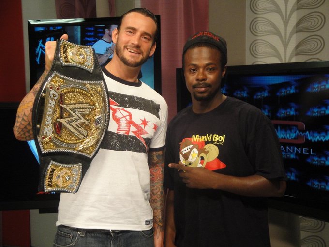 DJFLIP - Going threw my phone found this me and @CMPunk That belt was heavy lol https://t.co/JjWQstPPMu