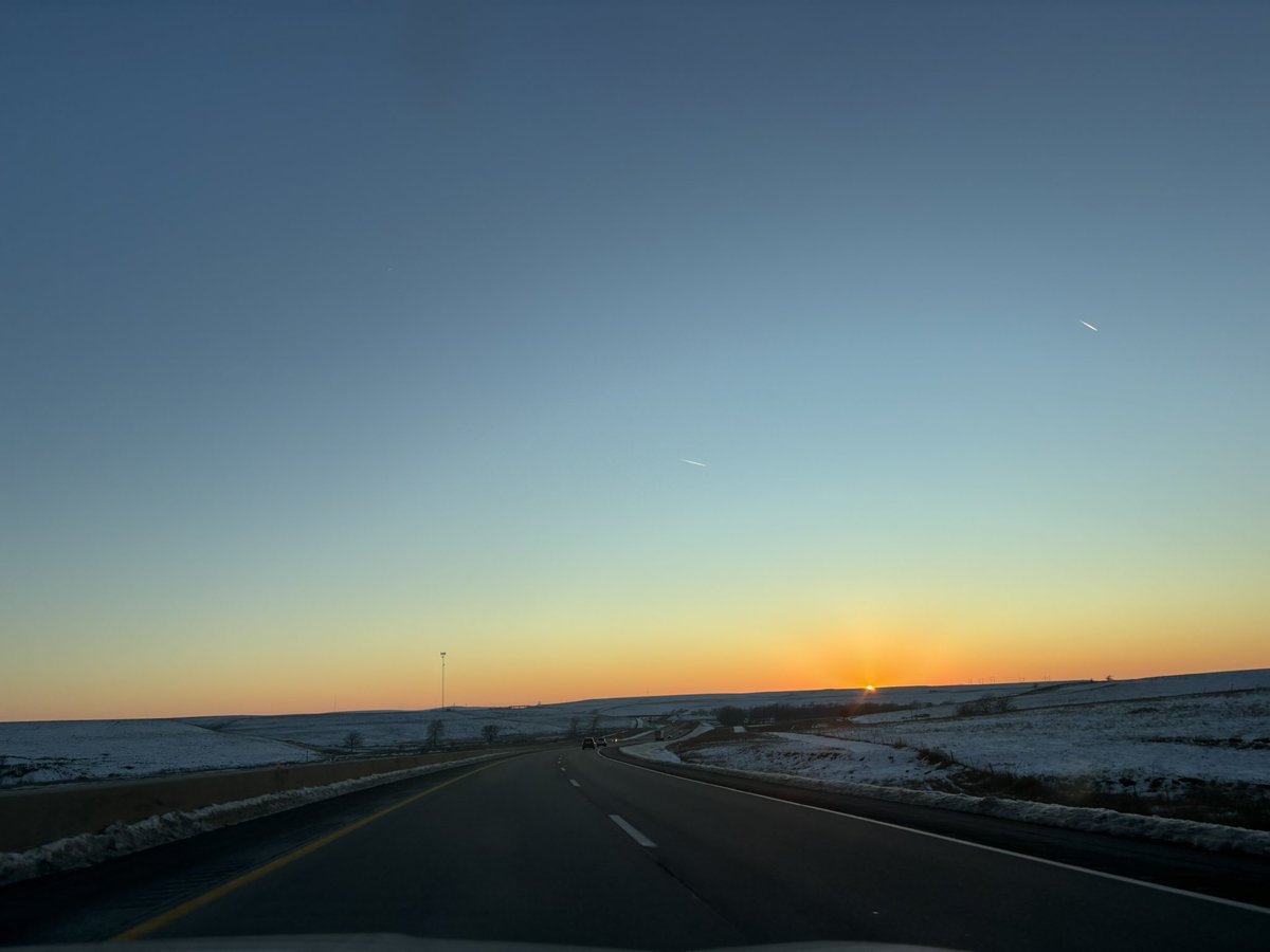 Sparks joy, headed-through-the-snowy-Flint-Hills-to-<a href="/ESSDACK/">ESSDACK</a> edition. My phone camera doesn’t do all the shades of pink and purple justice, it’s a stunning sunset.