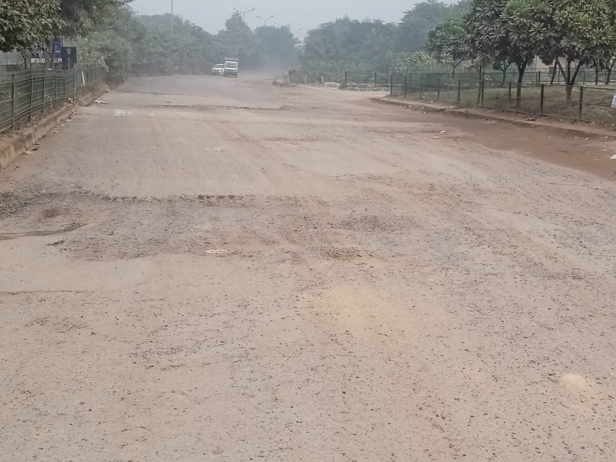 The condition of sector dividing roads in #New_Gurugram is pathetic 
Dust on these broken roads is the main contributor towards #pollution &amp; the potholes are of big &amp; large size are prone to #accidents &amp; damaging the vehicles, <a href="/OfficialGMDA/">GMDA</a> is sleeping.

Pic-Sec 92/95 dividing rd