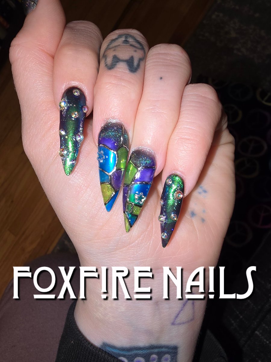 FoxfireNails's tweet photo. I did these a week ago, and the tragic part is I have to cut them down short for this weekend because we're going on a ski trip, and these long nails will not fit comfortably in my ski gloves. 💀 https://t.co/2JU7nJPdp6