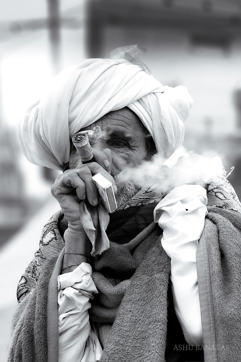 Ashubanaras's tweet photo. Each puff whispers a story of resilience...!
.
.
.
.
.
.
.
.
.
#varanasi #HumanExpressions #StreetTales #PortraitOfLife #StreetVibes #DepthOfLife #Bnw 
#SoulfulPortraits #StreetChronicles #StreetPhotography #SilentStories https://t.co/qMkViO7hQx