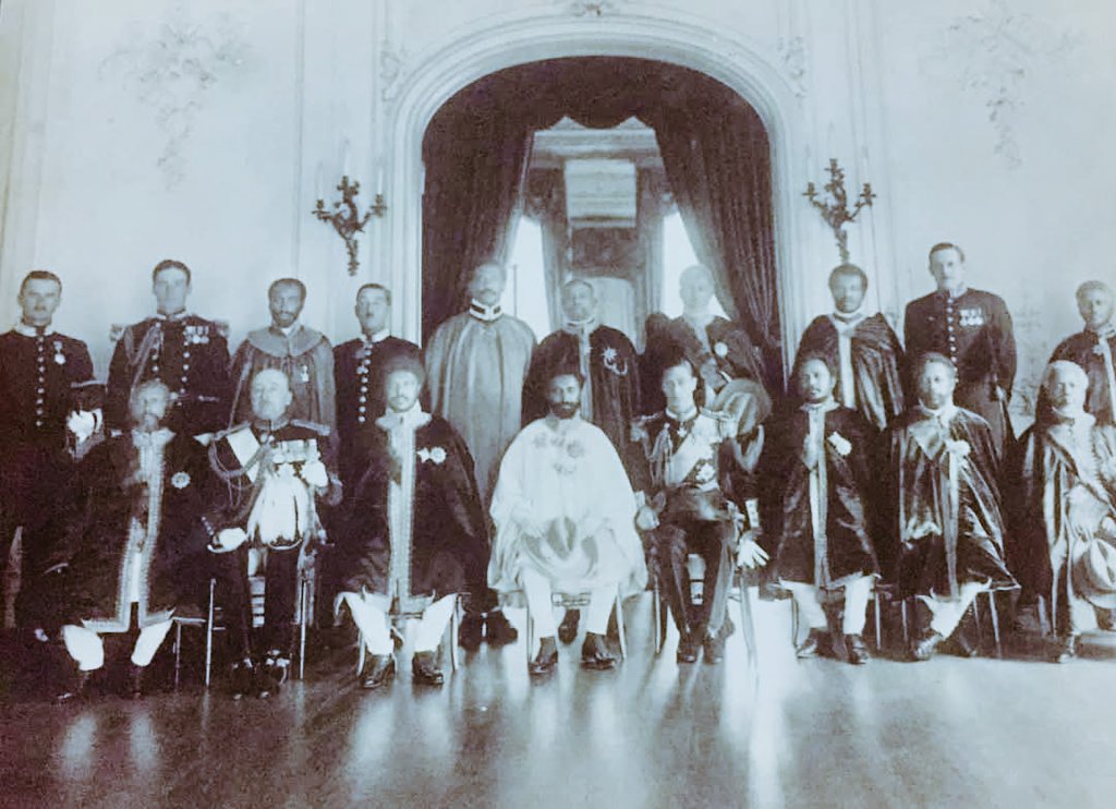 Rare photo of Haile Selassie I, Emperor of Ethiopia (Solomonic Dynasty) at Buckingham Palace in 1924 with King George VI of the UK (then Duke of York), with Ethiopian and British nobility. PS: There is a 19th-century Solomonic Ethiopian prince buried inside of Windsor Castle.