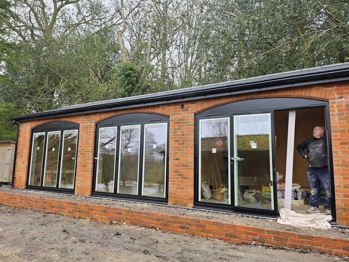 This Detached Gym and Office Project was erected on an unused piece of land on the customers property. This completely detached building is generous in size and finished off with 4 sets of bi fold doors so that the whole space can be opened up in the warmer months.