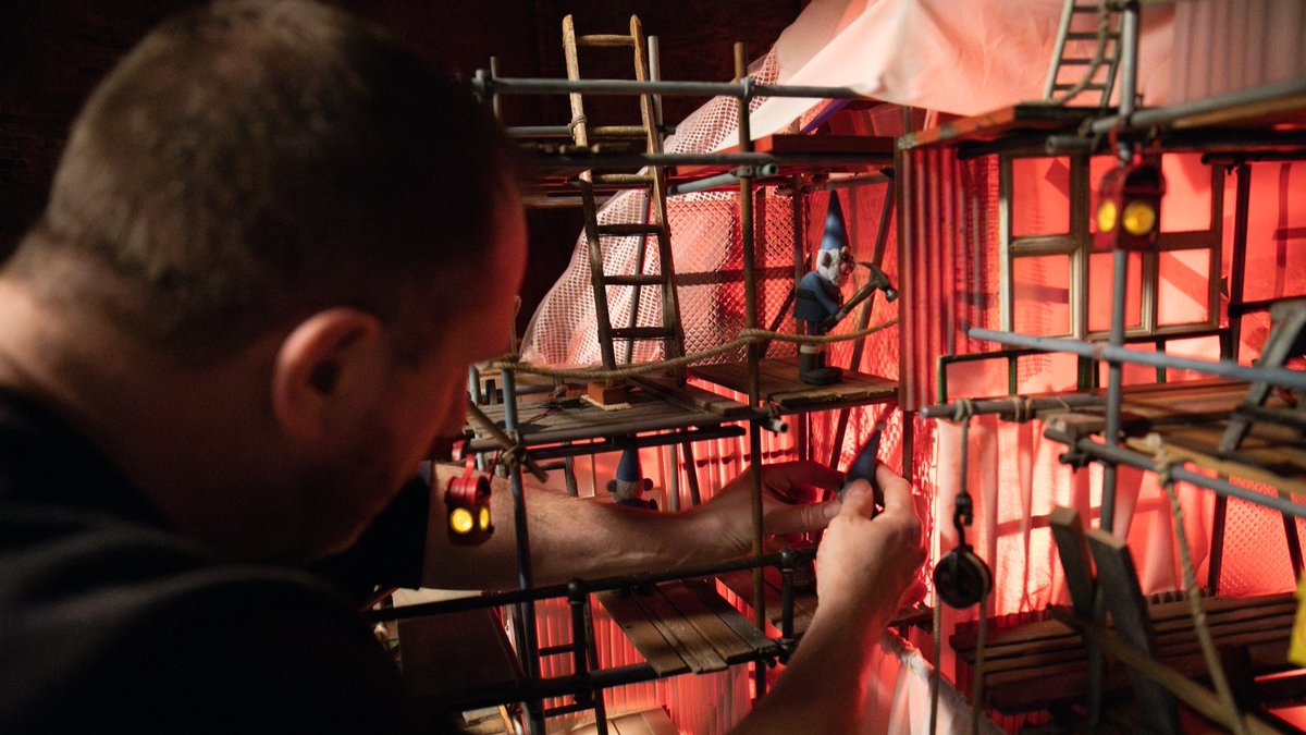 aardman's tweet photo. Caution, Norbots at work! ⚠️ 

See how our team made the Norbots basement scene a reality, from the initial concept art to the final shot. https://t.co/rtY8h7Sh7W