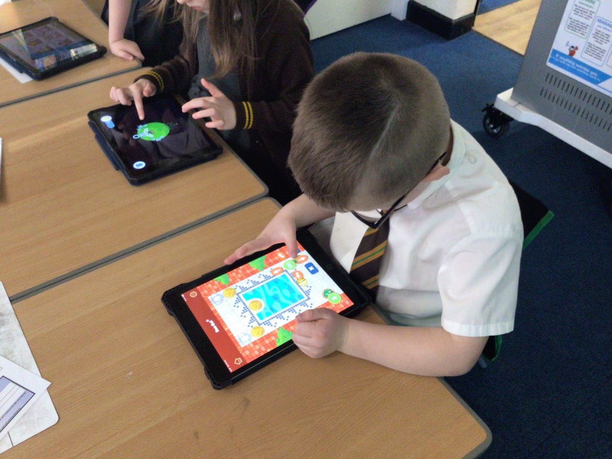 2StHerberts's tweet image. We’re having a look at algorithms and how to program an object to move. We are challenging ourselves by helping the bee bot get to the flower. #StHerbertsComputing