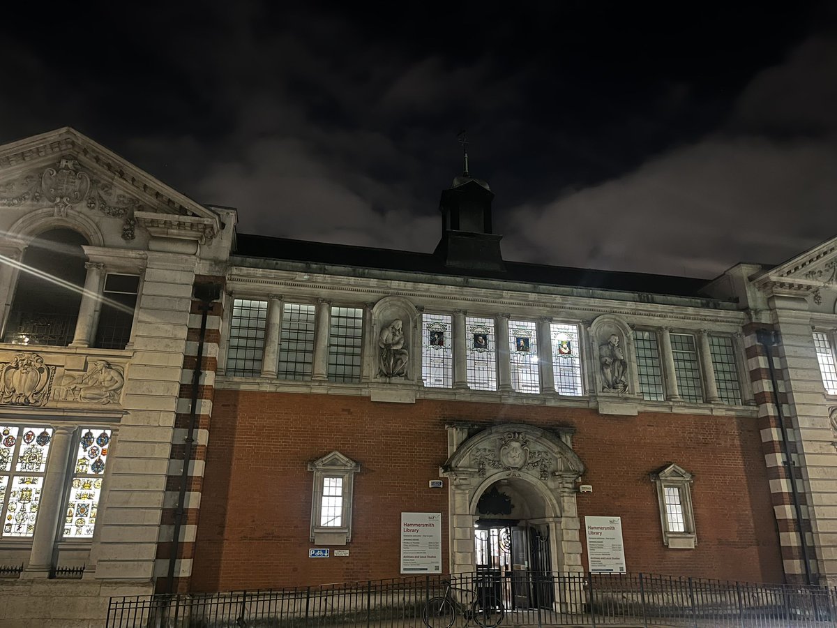 OldLondonW14's tweet photo. Hammersmith Library looks great tonight with the stained glass lit up. Here are the architectural design plans for Hammersmith Library on Shepherds Bush Road, which was funded through a Carnegie grant. Narrowly escaped closure a few years ago. #UseYourLocalLibrary https://t.co/BtMIx8nMS0