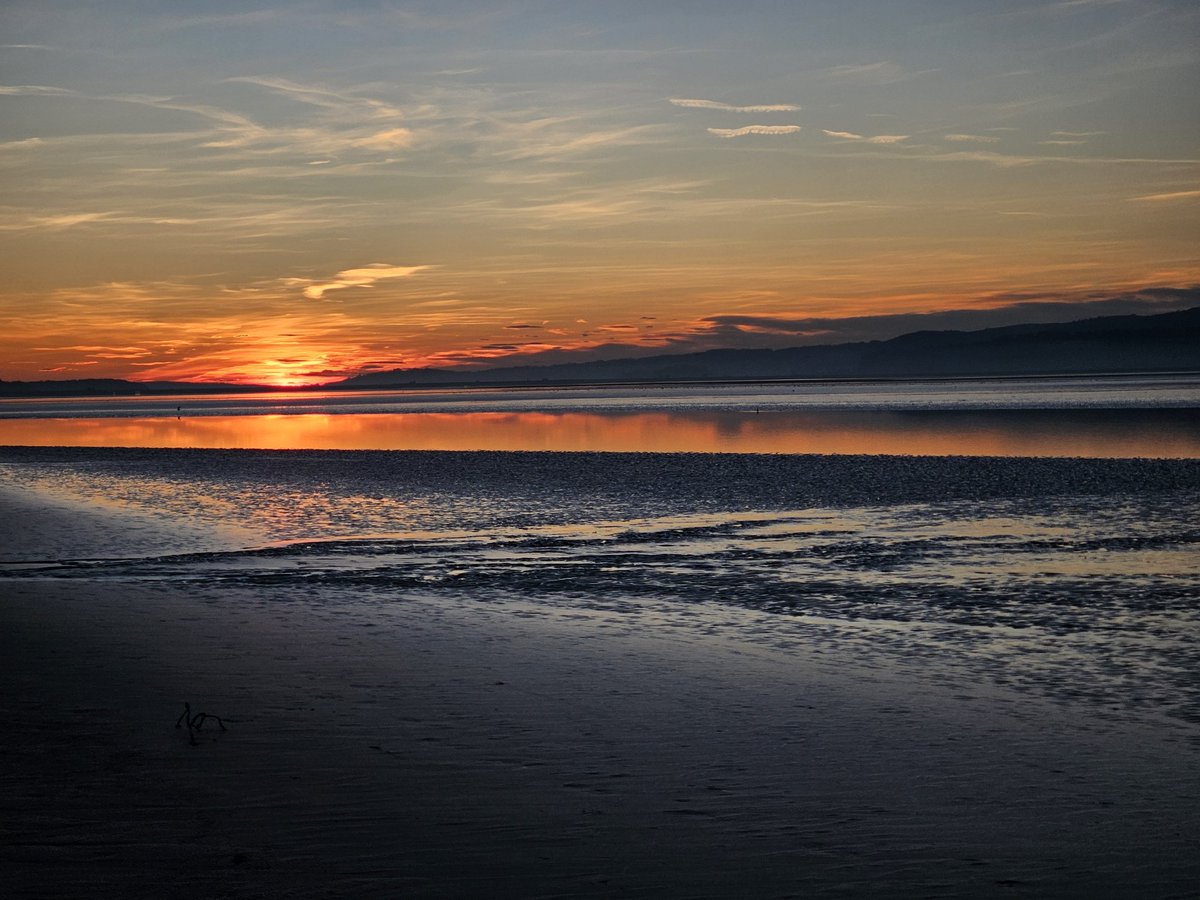 First light over the hills from home this morning, and sunset over the Kent Estuary this evening #Cumbria