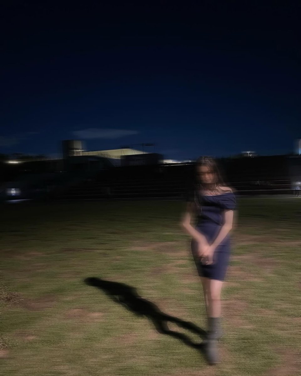 밤의 고요함에 빠져서.. ”  ️️ ️️️The world around her fades into a blur, creating a serene yet slightly eerie atmosphere,  ♥︎