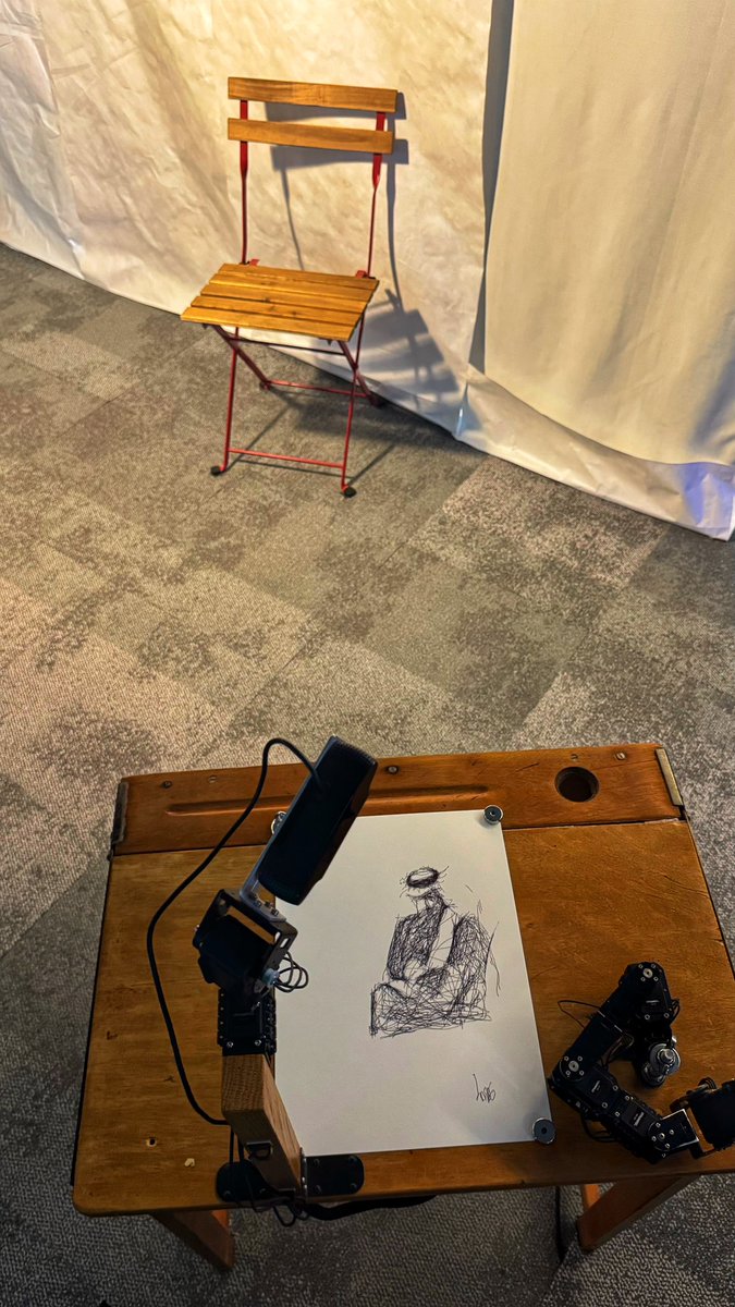 MDRsulaiti's tweet photo. AI's technological advancements are undeniable, regardless of your stance. Just yesterday, while I was absorbed in reading, AI created my portrait at the "AI or NAY?" exhibit @NUQatar  @themediamajlis. How awesome is that?!  @QF 

Very proud of @alkubaissii and his team! https://t.co/PWKUGlS3pN