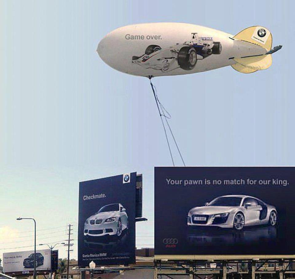gardener1603's tweet photo. Who knew billboards could play chess? ♟️
Audi: Your move.
BMW: Checkmate.
Audi: Our king > your pawn.
BMW: Drops a Formula 1 blimp like it’s the mic

@BMW @AudiOfficial  
It was luxury drama at 200 mph. when brands race, creativity wins, DUHH https://t.co/eOlsXxj1J3