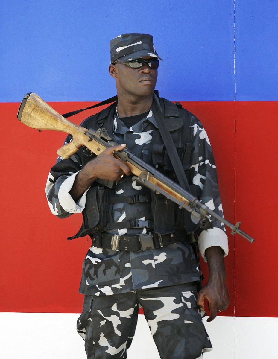 trip_to_valkiri's tweet image. Haitian Policeman using M14E2 7.62 Automatic rifle, 2006 period.