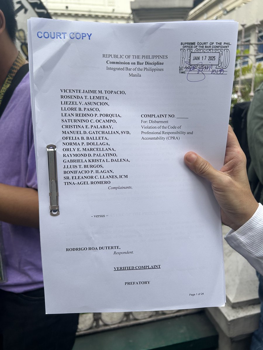 joahnacasilao's tweet photo. LOOK: Families of EJK victims and human rights advocates file a disbarment complaint against former President Rodrigo Duterte before the Supreme Court @gmanews @gmanewsbreaking https://t.co/qtKtOHxHme