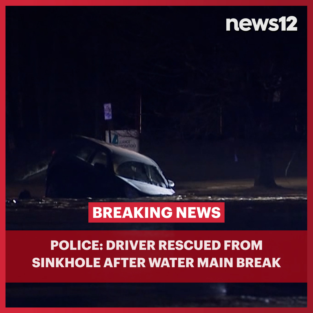 News12NJ's tweet photo. WATER RESCUE: Emergency crews were in Wayne Township Thursday night rescuing a driver from a sinkhole following a water main break.
#news12 #newjersey #WaterRescue #Emergency #WaterMainBreak #WayneTownship
https://t.co/WdCbgmRqDh https://t.co/GYTDR4k5Pt