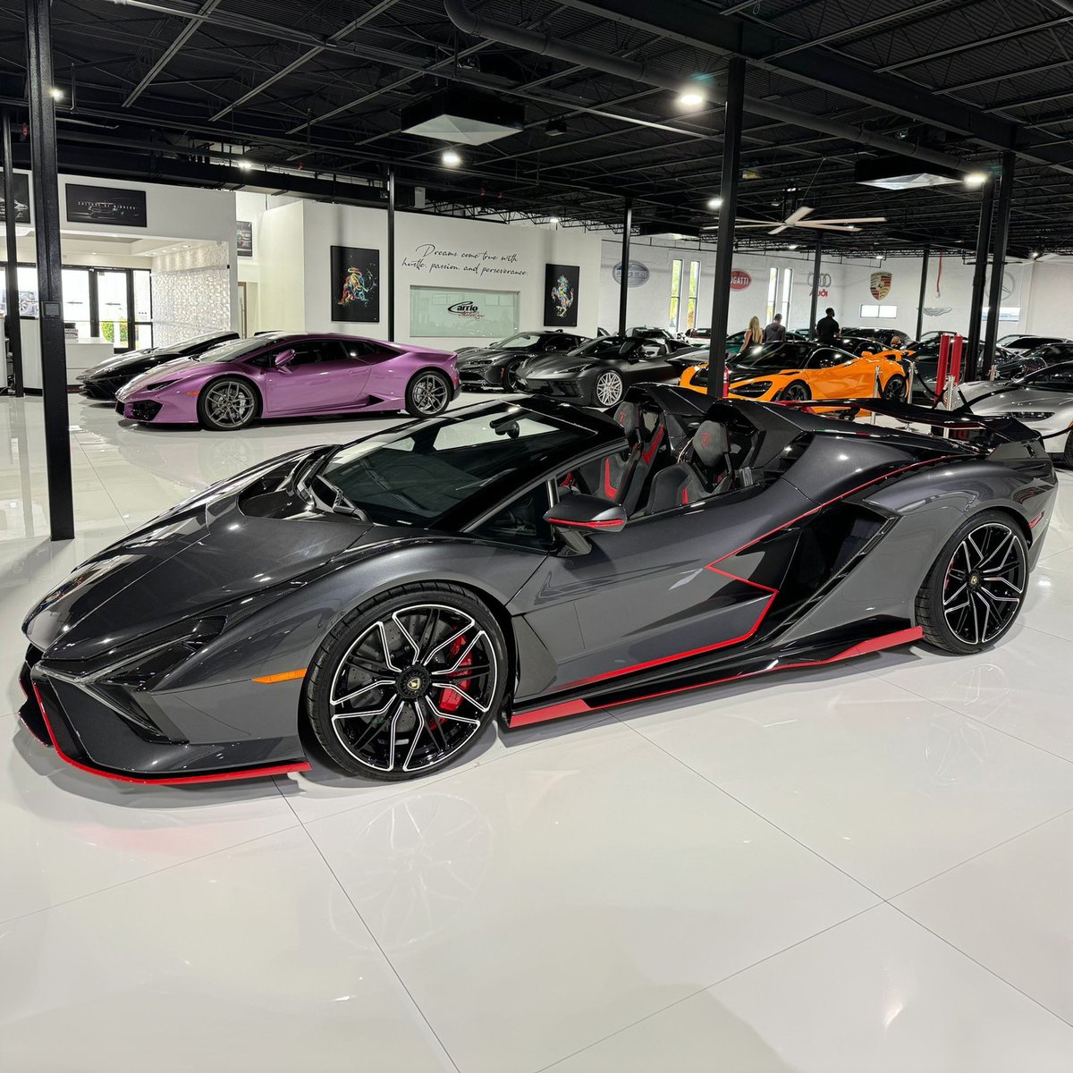 duPontREGISTRY's tweet image. 2021 Lamborghini Sian Roadster | 1 of just 19 in the world! | Asking Price: $4,999,998

The exterior of this configuration features Lamborghini’s stealthy Grigio Lynx finish with vibrant Rosso Efesto accents. Along with pinstripes that highlight the Sian Roadster’s shape, the…