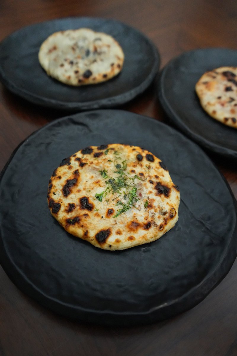 Indian_Accent's tweet photo. kulchas at indian accent have a following of their own…from blue cheese to bacon, each bite blends bold flavours with culinary finesse that’ll make you rethink this humble indian classic.
#indianaccent #inventiveindian #delhi https://t.co/TNywwYkYWL